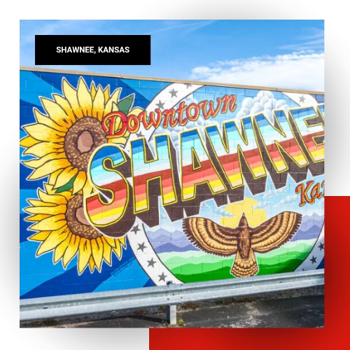 Colorful Downtown Shawnee Kansas mural featuring a sunflower and hawk on a building exterior in Shawnee, Kansas
