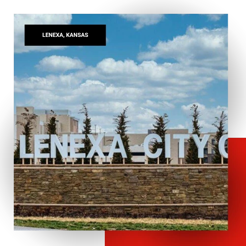 Large outdoor Lenexa City Center monument sign against a blue sky in Lenexa, Kansas
